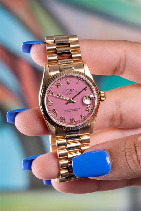 rolex watch pink face.